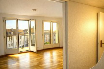 Helle Attikawohnung mit grosser Terrasse und Cheminée 1/5