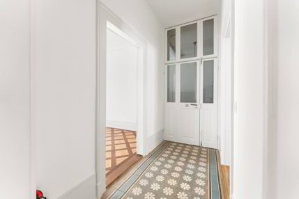 Stilvoll sanierte Altbauwohnung mit eigenem Garten an zentraler Lage... 1/5