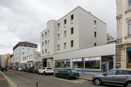 Immeuble mixte avec un rendement de 6,02 % au centre de La Chaux-de-Fonds 1/3