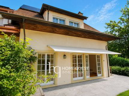 Une villa baignée de lumière au coeur de Chailly 1/5