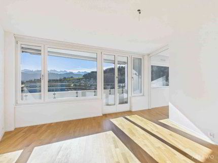 Wohnen hoch hinaus: 12. Etage mit Panorama über See und Berge 1/5