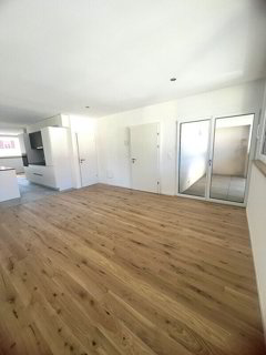Charmantes 4,5-Zimmer-Duplex mit Mezzanin in renovierter Bauernhof-Siedlung 1/5