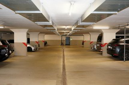 2 Tiefgaragenplätze mitten im Dorfzentrum 1/3