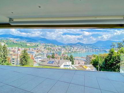 Lussuoso appartamento 4.5 locali con terrazza panoramica e vista lago 1/5