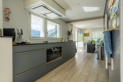 MEHRFAMILIENHAUS AN ZENTRALER UND RUHIGER LAGE 1/5