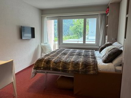 4-Zimmer-Studiopaket mit Balkon und Bergsicht in Arosa 1/5