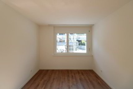 App. 3.5 pièces rez-de-chaussée / 3.5-Zimmerwohnung im Hochparterre 1/5