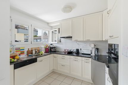 Lichtdurchflutete 4.5 Z' Maisonette WHG mit zwei Balkonen und einer Garagenbox 1/5