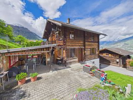 Charmantes Chalet mit Bauland und grosser Sommer-Loggia in Ergisch 1/5