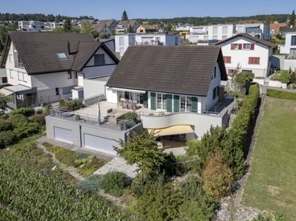 5.5-Zimmer-Einfamilienhaus mit 2.5-Zimmer-Einliegerwohnung 1/1