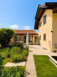 Maison familiale avec vaste jardin et potentiel d'aménagement 1/5