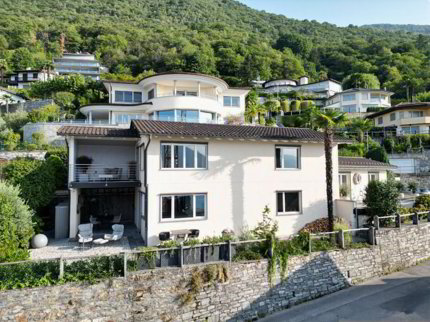 Villa de 6.5 pièces en vente à Brione sopra Minusio - 210 m² 1/5
