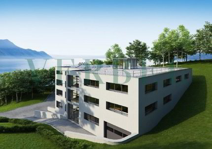 Terrain avec permis en force pour immeuble multifonctionnel 1/1