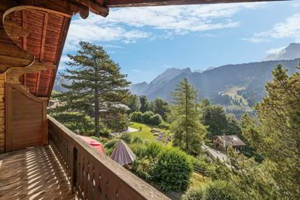 Spacieux chalet de 4 appartements avec vue spectaculaire et grand jard 1/5