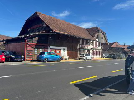 Ertragsstarkes Wohn-Gewerbehaus, 3 Einheiten, 120 Parkplätze 1/3