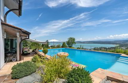 7.5-Zi.-Terrassenhaus mit Pool und Seesicht in Bellerive kaufen 1/5