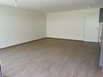 REZ avec grande terrasse - Neuf - Place de parc intérieure 1/5
