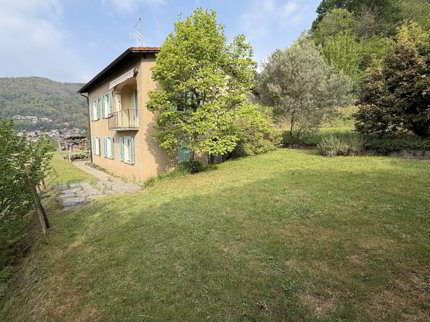 Haus mit Einliegerwohnung und Seesicht Casa con appartamento indipendente e vista lago. 1/5