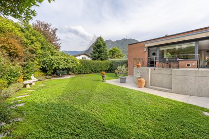VON ATTILIO PANZERI ENTWORFENES HAUS MIT GARTEN IN GENTILINO 1/5