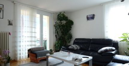 Appartement de 4.5 pièces au 1er étage, 2 balcons et garage individuel 1/5