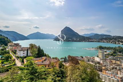 Moderno attico con vista lago 1/1