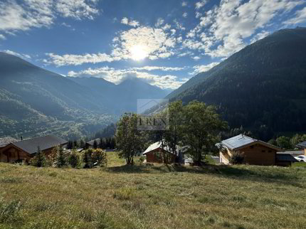 Superbe terrain à bâtir avec vue sur les montagnes et soleil à Grimentz 1/5