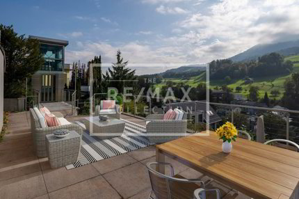 Exklusive 6.5-Zimmer-Terrassen-Wohnung mit herrlicher Aussicht und 5 Garagenplätzen! 1/5