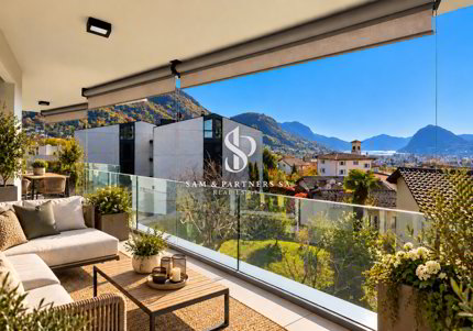 Attico con Rooftop e vista lago 1/5